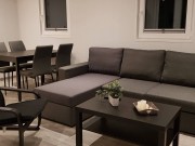 Holterberg 4-6 pers. Chalet Binnen zit en eethoek.jpg