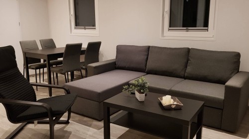 Holterberg 4-6 pers. Chalet Binnen zit en eethoek.jpg